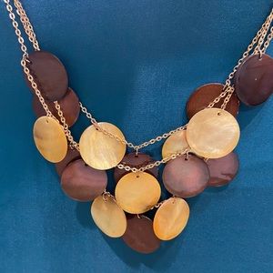 Beautiful Tri level cascading necklace. iridescent bronze and golden tan